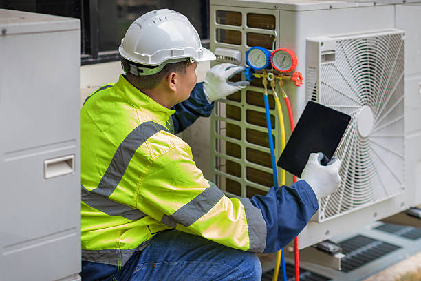 Professional Emergency Hvac Repair technician working in New Paris, IN